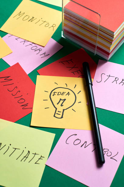 istock Brainstorming session with sticky notes on strategy and mission, highlighting key actions and ideas 2170051721
