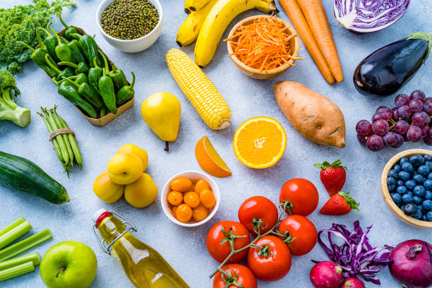 istock Healthy rainbow colored fruits and vegetables background 2170051906
