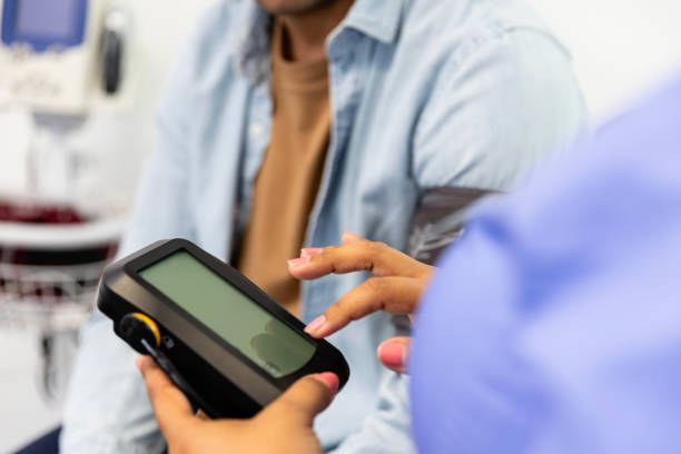 istock Over the shoulder view of unrecognizable healthcare professional using a device screen while working at the clinic 2170052022