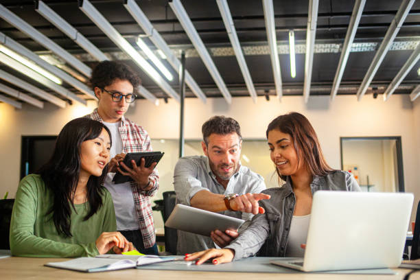 istock Young diverse group of professionals brainstorming for new company project 2170053687