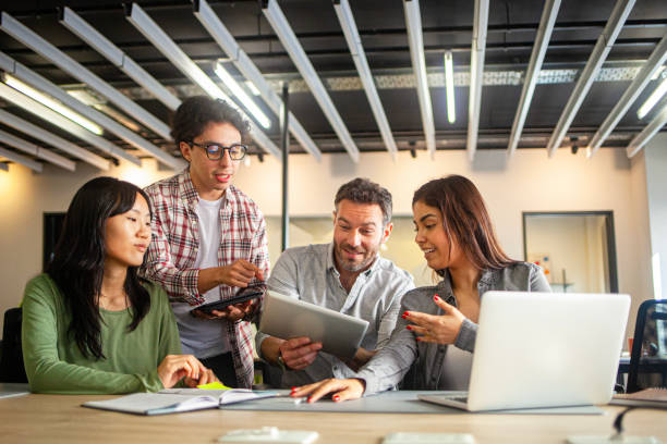 istock Young diverse group of professionals brainstorming for new company project 2170053690