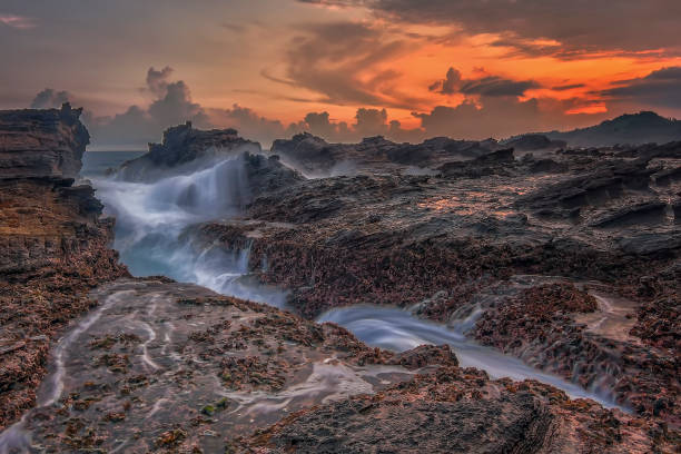 istock Rock and waves at savarna beach, indonesia 2170055802