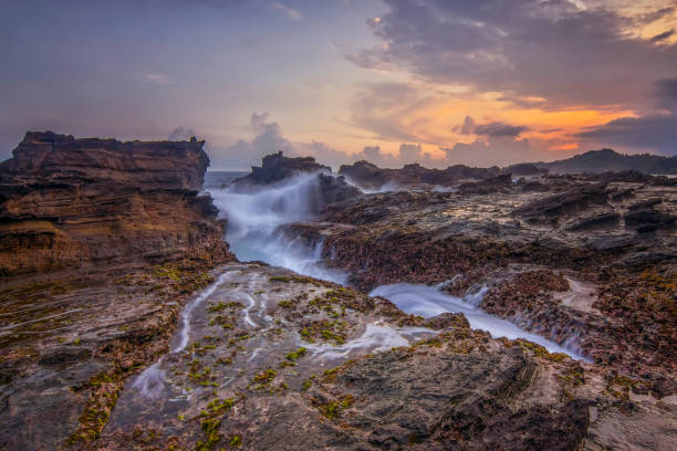 istock Rock and waves at savarna beach, indonesia 2170055804