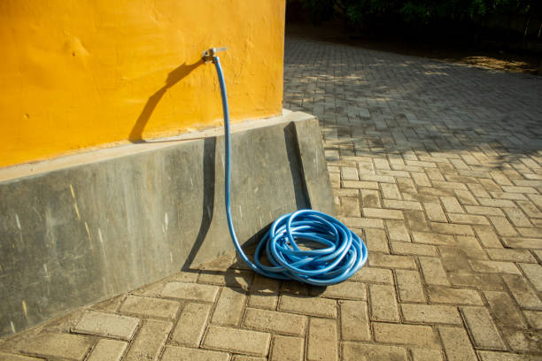 istock blue water hose is on the clean floor 2170056475