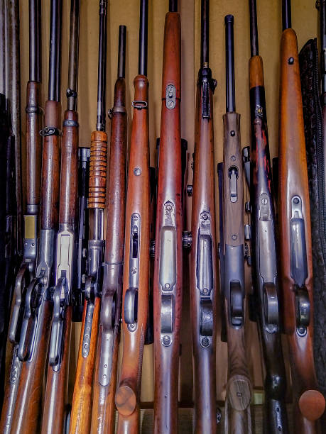 istock Hunting gun collector rifles rack 2170056985