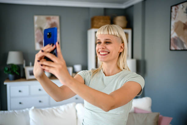 istock Young woman taking a selfie 2170057527