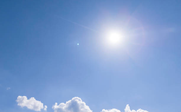 istock blue sky with white cloud background. Clear blue sky and white clouds 2170057574