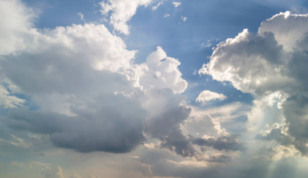 istock blue sky with white cloud background. Clear blue sky and white clouds 2170057600