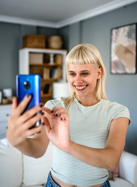 istock Woman taking selfies at home 2170057732
