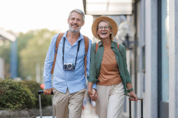 istock Cheerful tourists walking in the city 2170059452