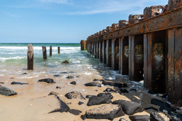istock Old rusty broken and busted pier, Cape Hatteras National Seashore. Outer Banks, North Carolina 2170065051