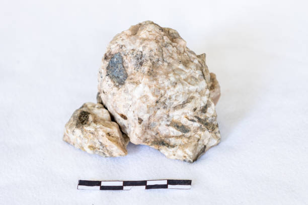istock Example of a plagioclase and biotite on a white background with a 5cm scale 2170066397