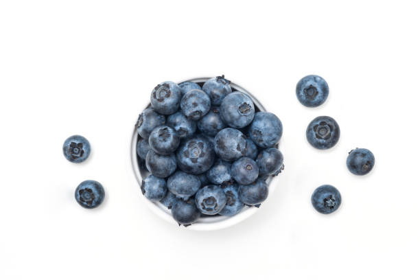 istock Bowl of fresh blueberries on white. Top view 2170066926