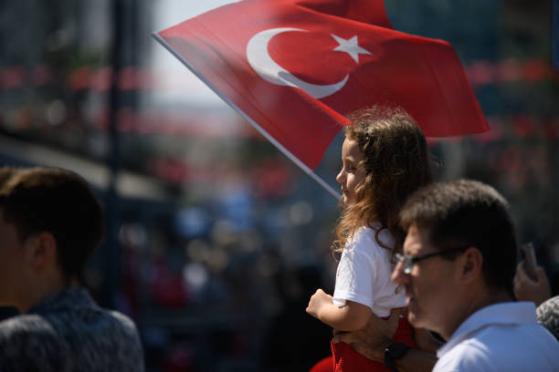 Little Girl Holding Turkish Flag on Victory Day stock photo
