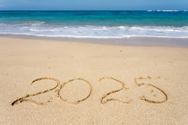 istock New Year 2023, lettering on the beach with wave 2170083904