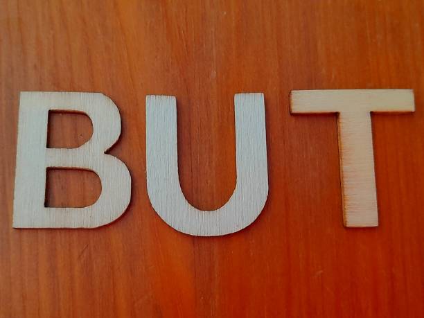 istock But subtitle or text with wooden background 2170084504
