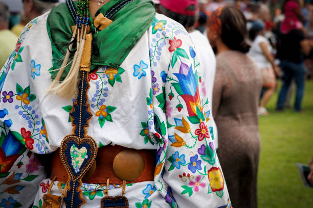 Suffolk, Virginia, USA - August 17, 2024: The ornate dress of a Native American woman at the 36th Annual Nansemond Indian Powwow.