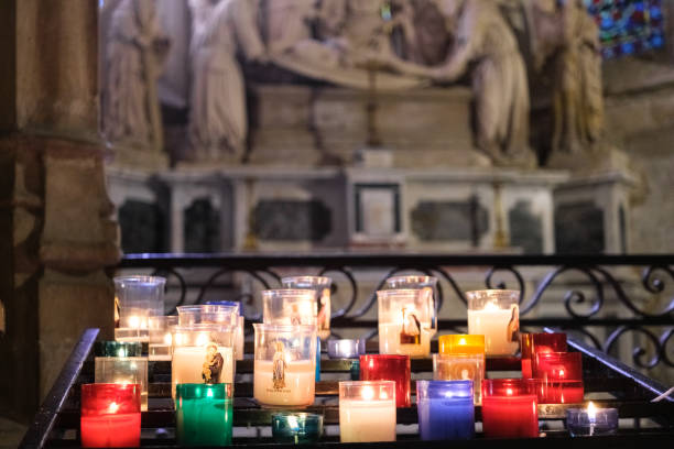 istock Colorful offering candles inside a church 2170089684