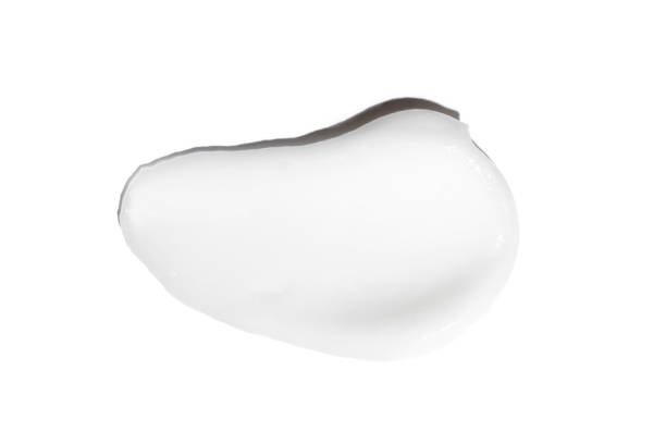 istock Face cream stroke isolated on white background. White exfoliation cream smear smudge sample. face or body skincare product swatch. showcase of the product 2170091889