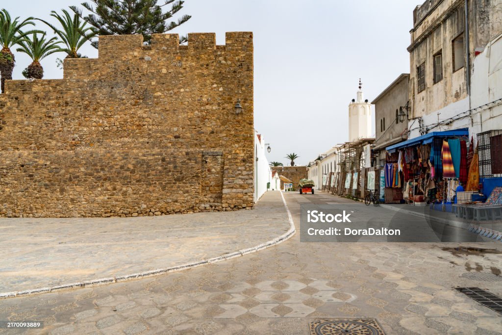 The view Place abdallah guennoun and Av. mohamed el haloui, Asilah, Morocco The view Place abdallah guennoun and Av. mohamed el haloui, Asilah, Morocco. Africa Stock Photo The view Place abdallah guennoun and Av. mohamed el haloui, Asilah, Morocco The view Place abdallah guennoun and Av. mohamed el haloui, Asilah, Morocco. Africa Stock Photo