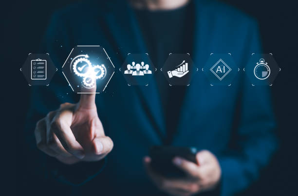 istock Automation and Workflow Optimization Concept. Businessman with icons automation, workflow optimization, and artificial intelligence. importance of efficient business processes using modern technology. 2170095469