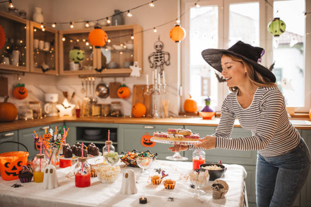 istock Woman preparing food table for Halloween 2170097758