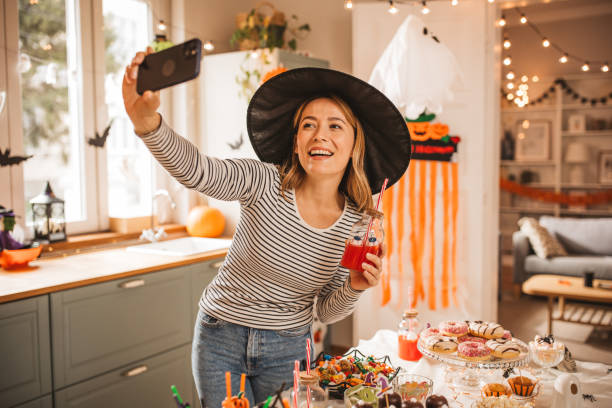 istock Woman preparing food table for Halloween 2170097775