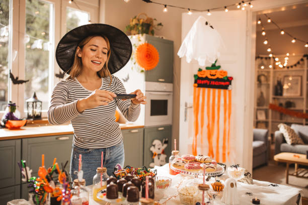istock Woman preparing food table for Halloween 2170097776