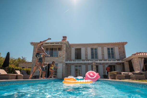 istock Multi-Generational Family Fun in the Pool 2170105738