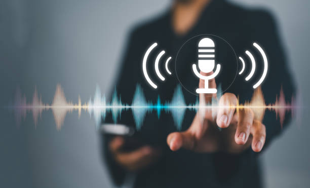 istock Business people Hand touch the microphone button on virtual screen. Blog speak talk advertising presentation, Voice recognition, speech detection and deep learning application, Voice Assistance 2170110307