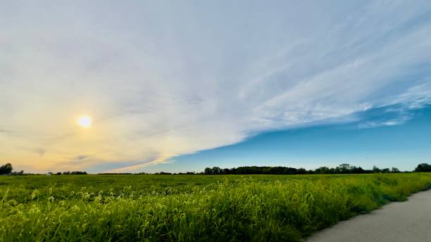 istock Sunset with halo over field. 2170113338