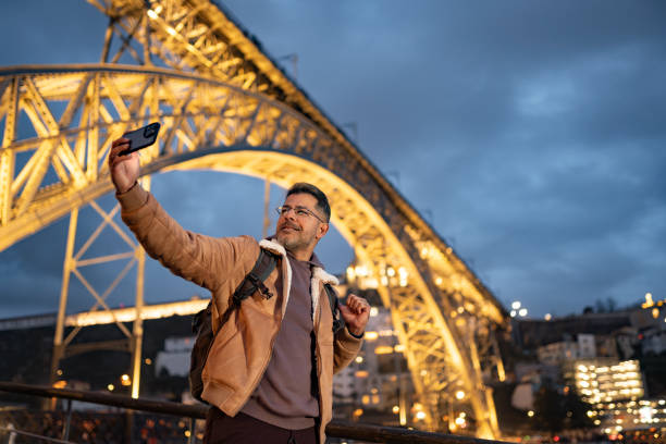 istock Man taking a selfie on the Luis I Bridge in Porto 2170113514
