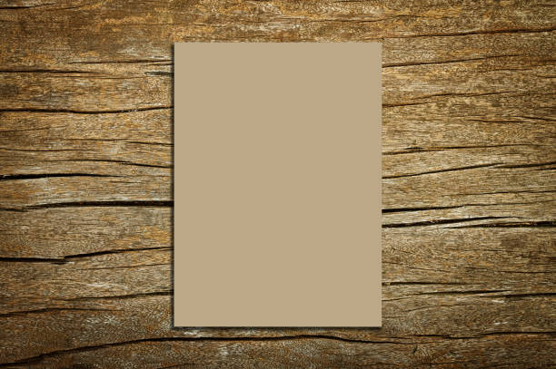 Empty placard poster on old wooden background