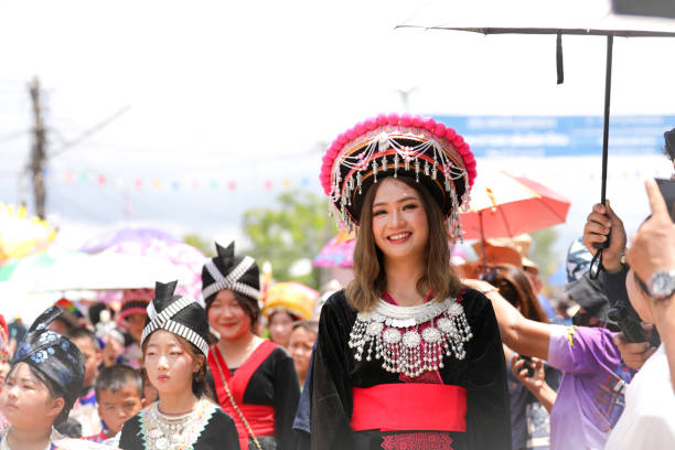 Loei, Thailand - July 8, 2024: Phi Ta Khon is the name of a performance in which players wear scary and ugly masks and wear tight, colorful costumes made from colorful fabric patterns.