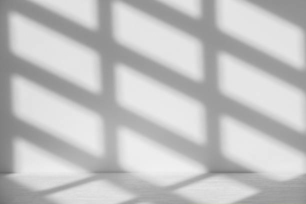 istock Studio style background wall decoration presentation uses white tones. with shadows cast from a nearby window, concept creating a decorative backdrop. 2170120852