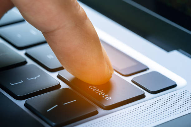 istock Finger of the computer user, he presses the delete button on the computer keyboard. 2170120991