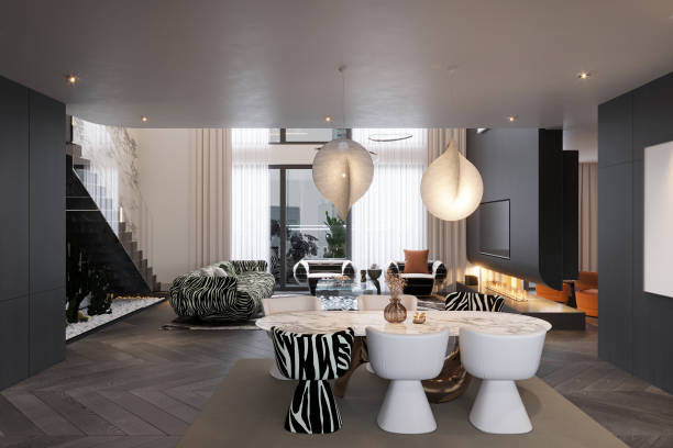 istock Detailed view of a modern interior black and white zebra-print sofa, a dining table with white chairs 2170123701
