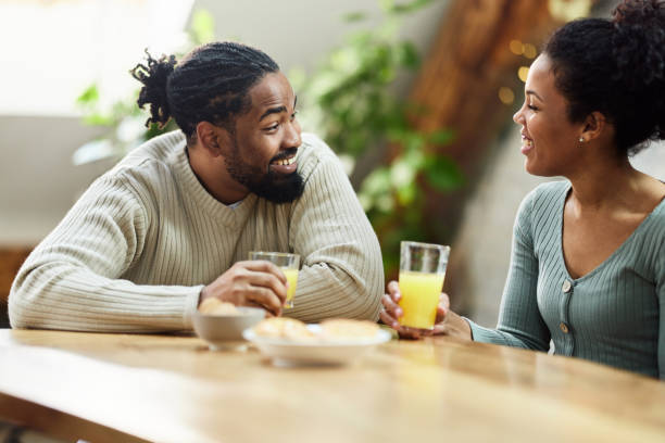 istock Happy black couple talking during morning at home. 2170127144
