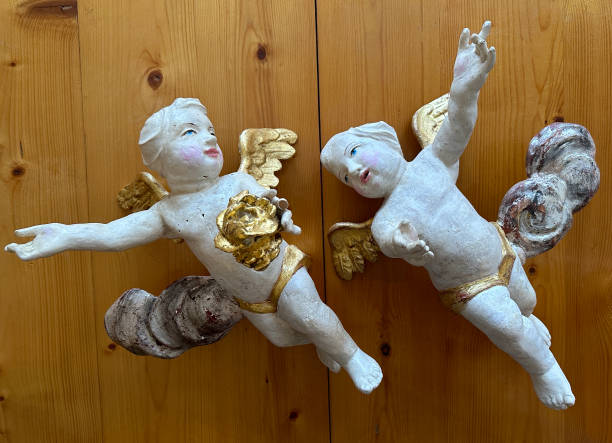 Angel figurines on the wooden floor