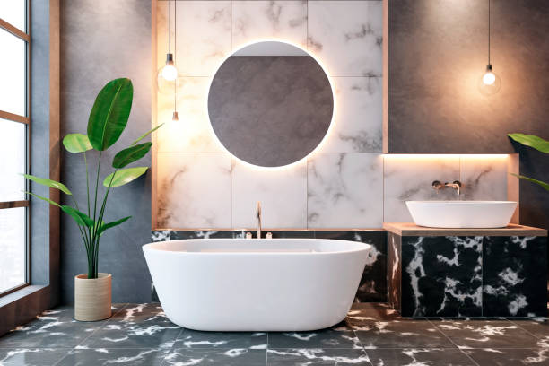 istock Modern luxury bathroom with freestanding bathtub and round mirror. 3D Rendering 2170131123