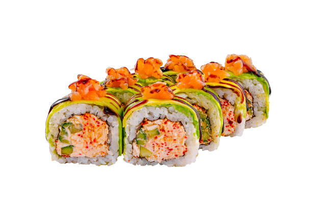istock Delicious sushi rolls with salmon and avocado lying on white background 2170132184