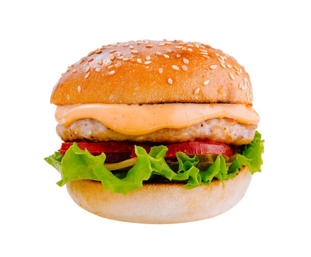 istock Delicious burger with chicken patty, vegetables and sauce on white background 2170132753