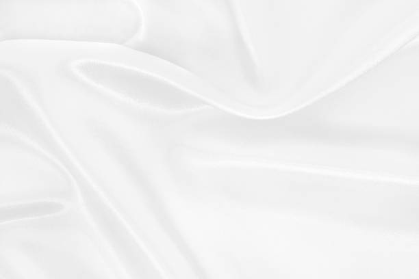 istock White fabric cloth texture for background and design art work, beautiful crumpled pattern of silk or linen. 2170134000