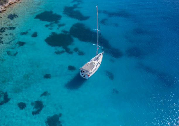 istock Anchored sailboat view from drone 2170136396