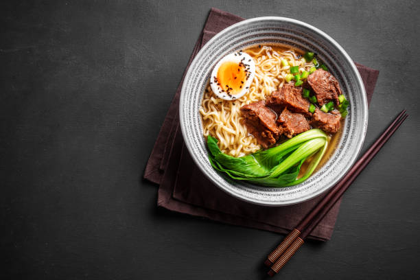 istock Ramen Asian noodles soup with beef, egg and pak choi 2170136628