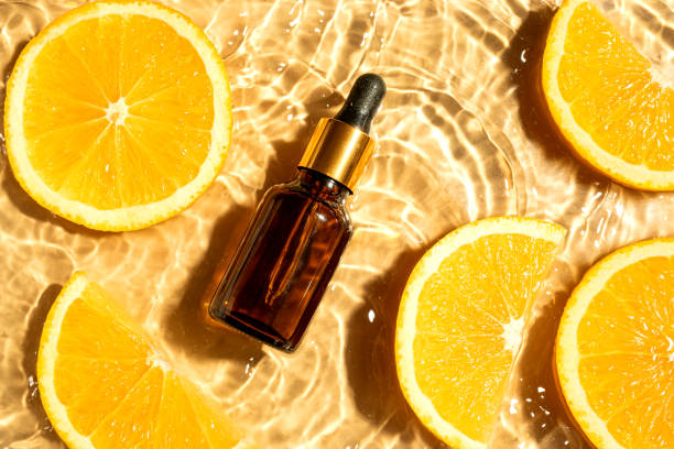 istock Face serum and orange citrus slices in water 2170136861