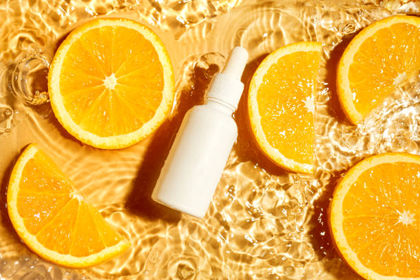 istock Face serum and orange citrus slices in water 2170136886