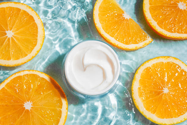 istock Cosmetic cream in clear water with orange citrus 2170136934
