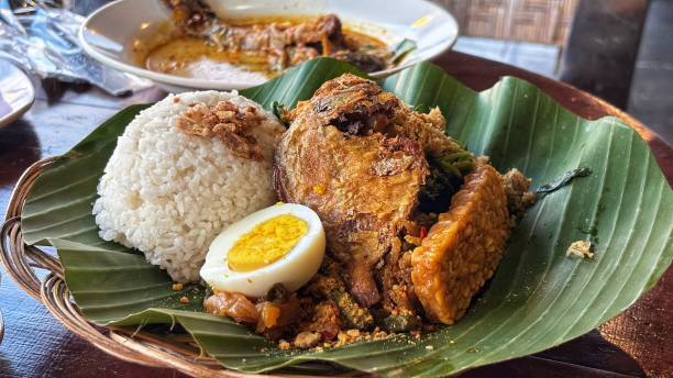 istock a plate of rice with side dishes 2170140023