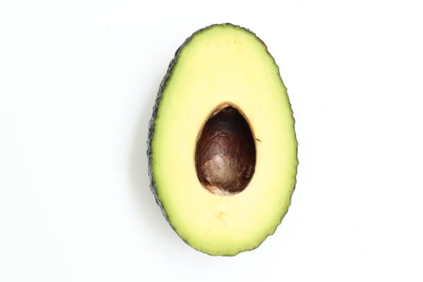 Tasty avocado slices enhance a colorful and vibrant meal.